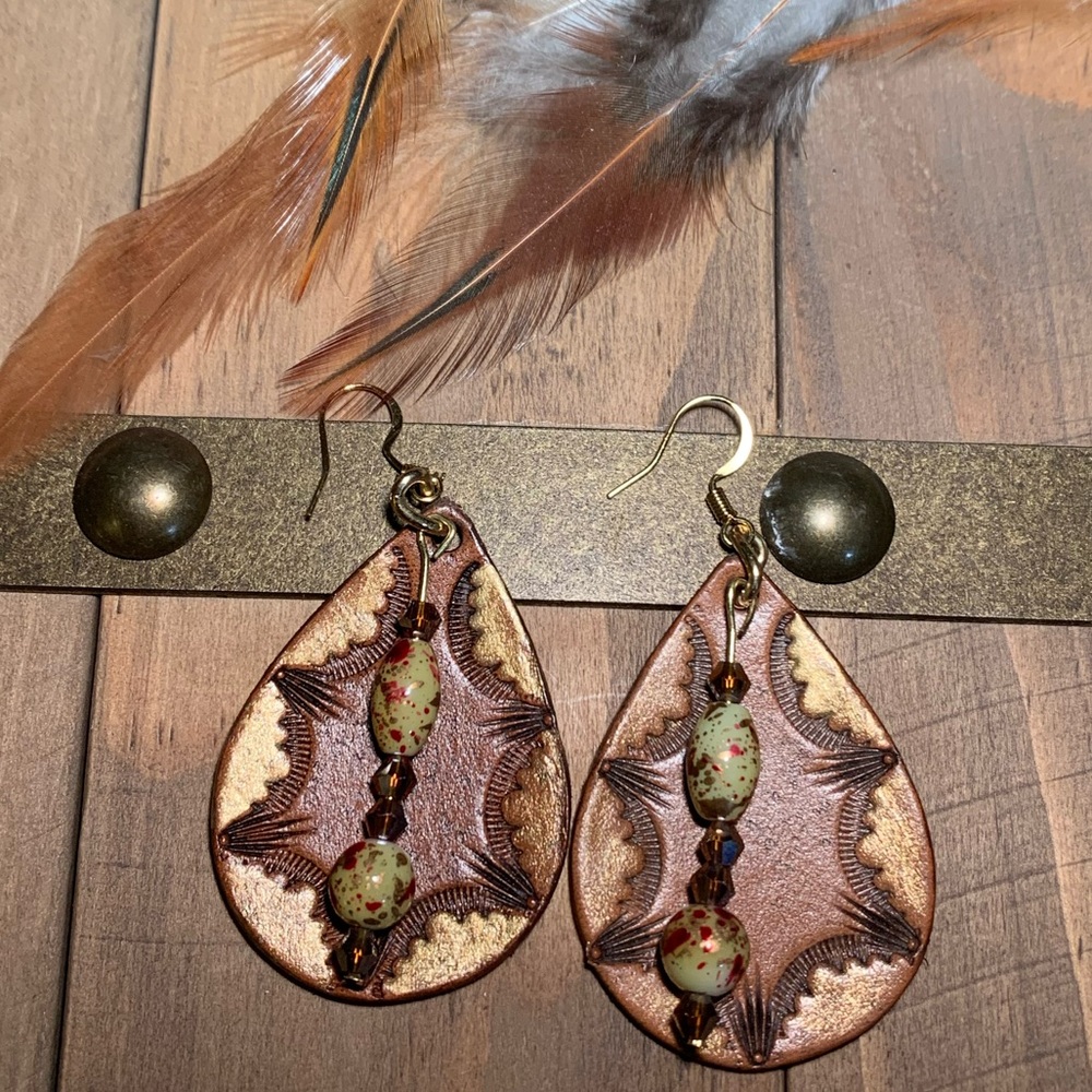 Tooled leather earrings with gold accents